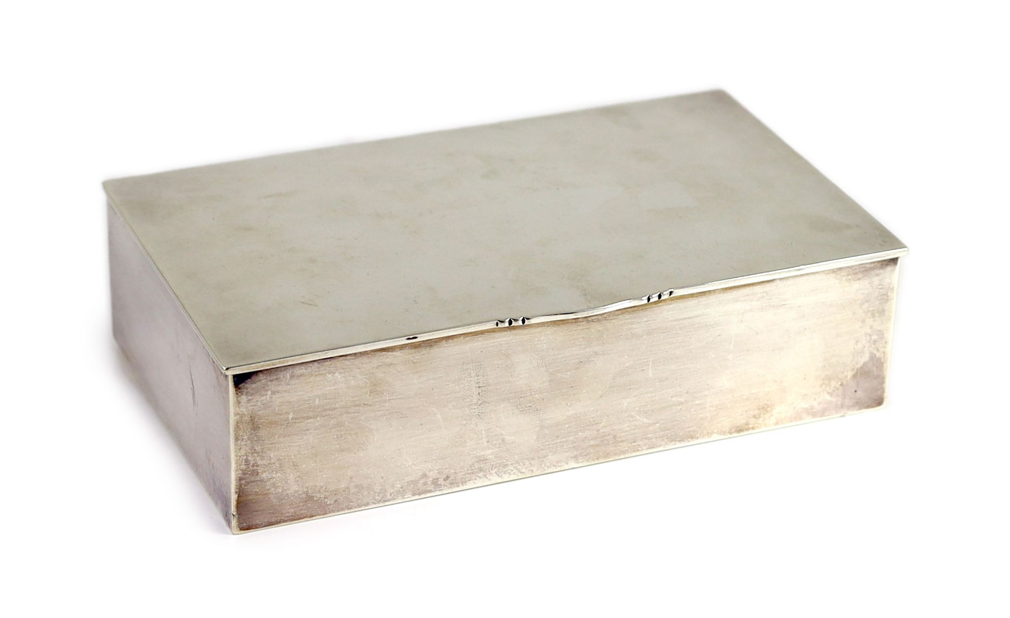 A 1930's planished silver rectangular cigarette box, by Georg Jensen, import marks, for London, 1938
